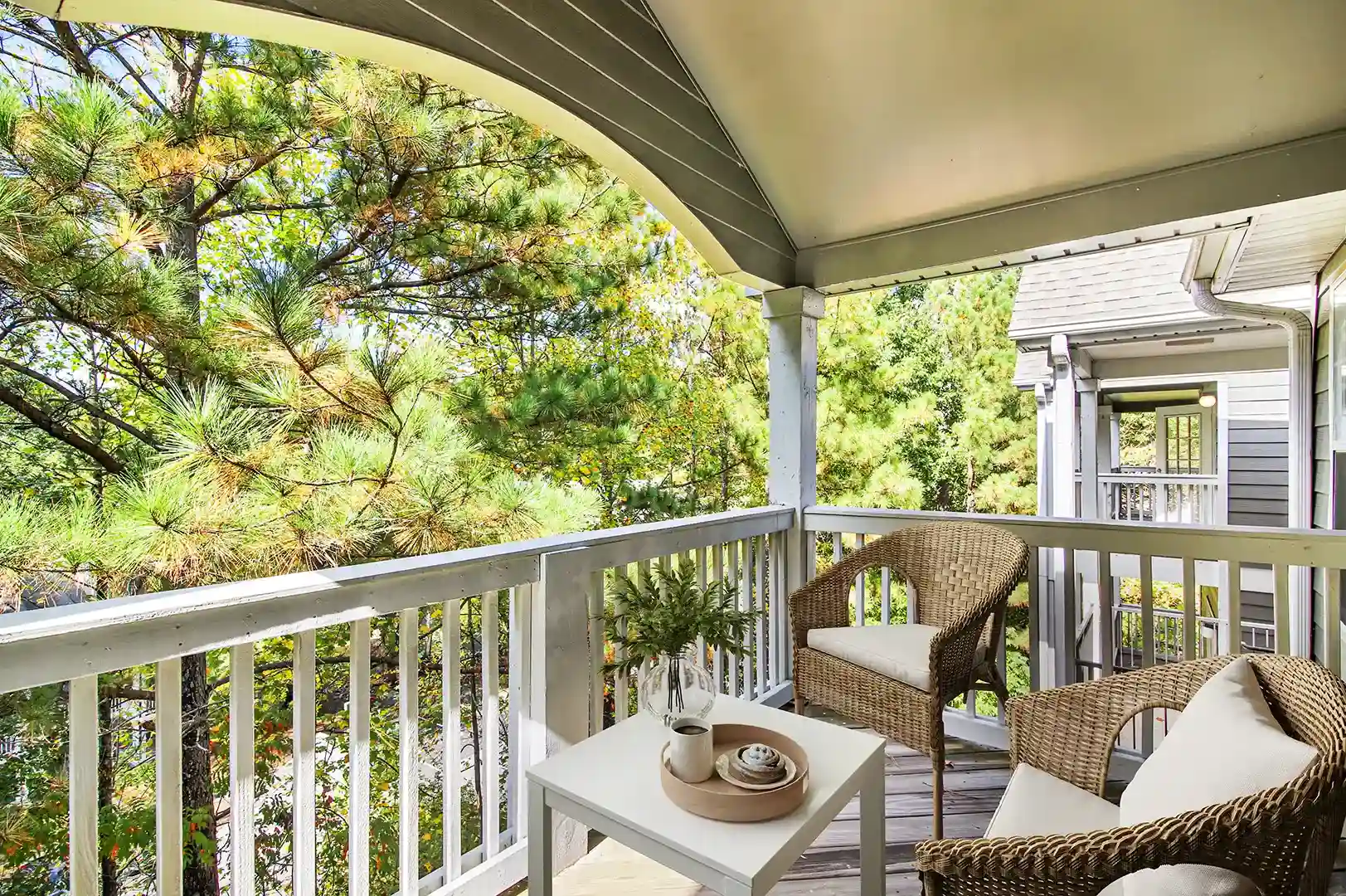 Model balcony overlooking beautiful trees