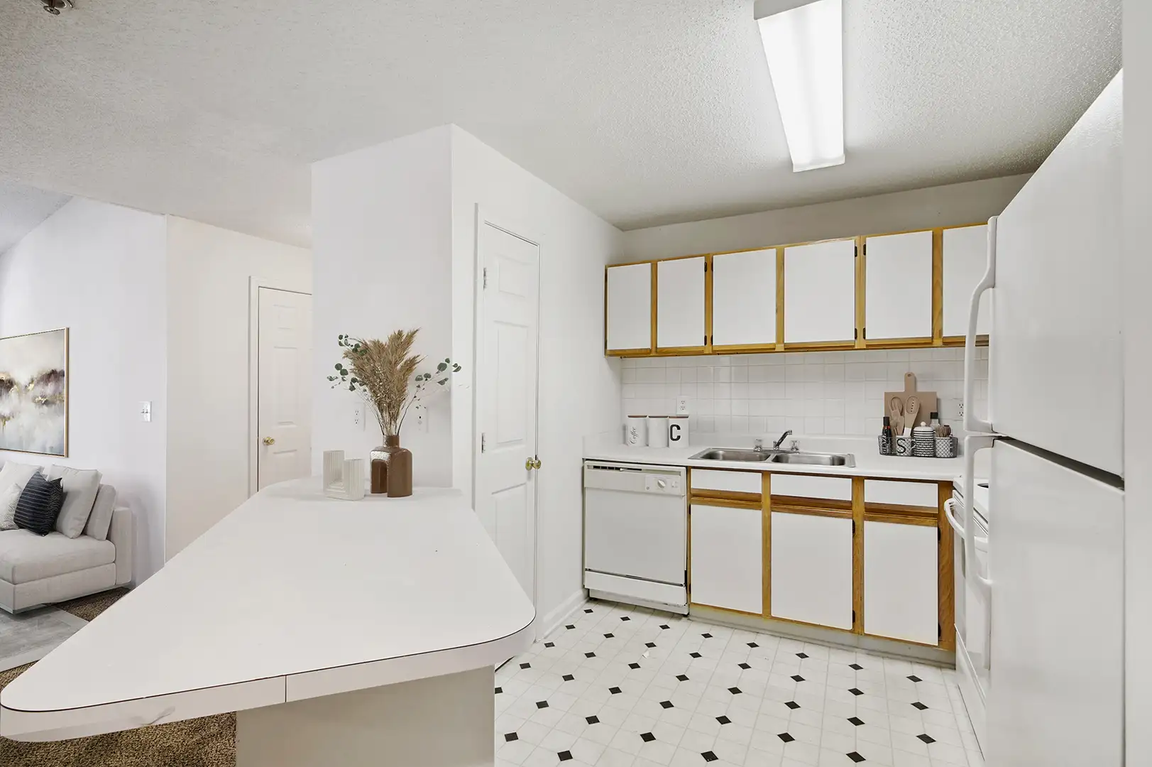 Kitchen with white cabinet doors and white appliances